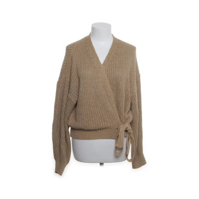 Costes Studio | Beige overslagvest met strikdetail