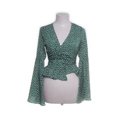 Loavies | Groene gestipte wikkelblouse