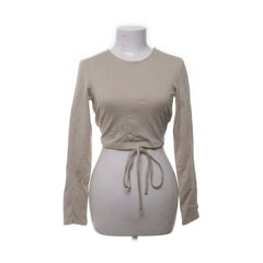 NA-KD | Beige crop top met strik