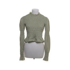 Monki | Groene gesmockte peplumtop