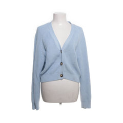 Monky | Lichtblauw gebreid vest met knopen