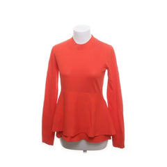 COS | Rode gebreide peplum trui