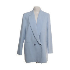 Reserved | Lichtblauwe oversized blazer met knoopsluiting