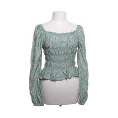 Chiquelle | Groene bloemenprint peplumtop