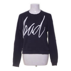 Nikkie | Zwarte sweater met 
