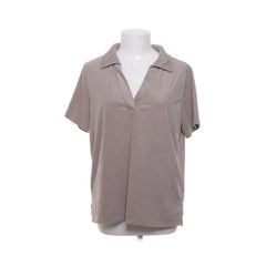 H&M | Taupe blouse met kraag en korte mouwen