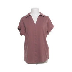 Gaharu | Roze V-hals poloshirt