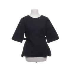 & Other Stories | Zwarte peplum blouse