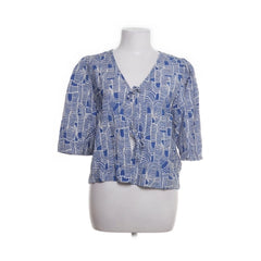 Object | Blauwe geometrische blouse