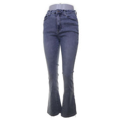 PrettyLittleThing | Donkerblauwe jeans met uitlopende pijpen