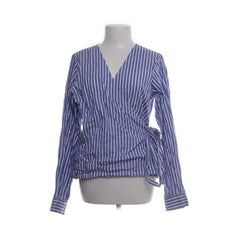 Minimum | Blauwe gestreepte wikkelblouse