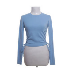 Zara | Lichtblauw ribgebreid shirt met zijstrikjes