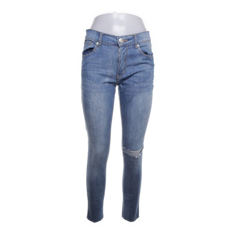 Lager 157 | Blauwe jeans met scheurdetail