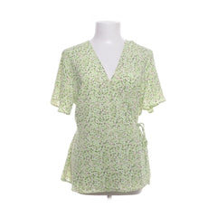 VILA | Groene bloemen wikkelblouse