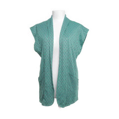 Gilet | Mintgroen vest met grafisch patroon en mouwloze snit