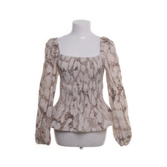 Pernilla Wahlgren | Beige gesmockte blouse
