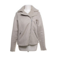 H&M | Beige jas met teddyvoering en ritssluiting