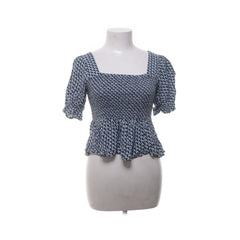 Pigalle | Blauwe geruite peplum top