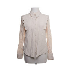 & Other Stories | Crèmekleurige blouse met geschulpte rand