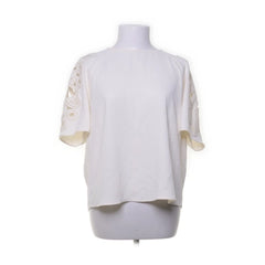Next | Witte kanten mouw top