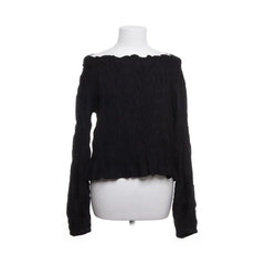 Cream | Zwarte gebreide off-shoulder trui