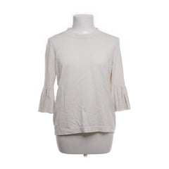 COS | Witte trui met klokmouwen