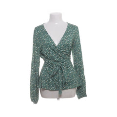 Happy Holly | Groene bloemenprint wikkelblouse