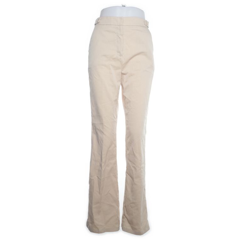 Misslisibell x NA-KD | Beige broek met uitlopende pijpen