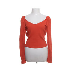 H&M | Oranje top met lange mouwen en V-hals